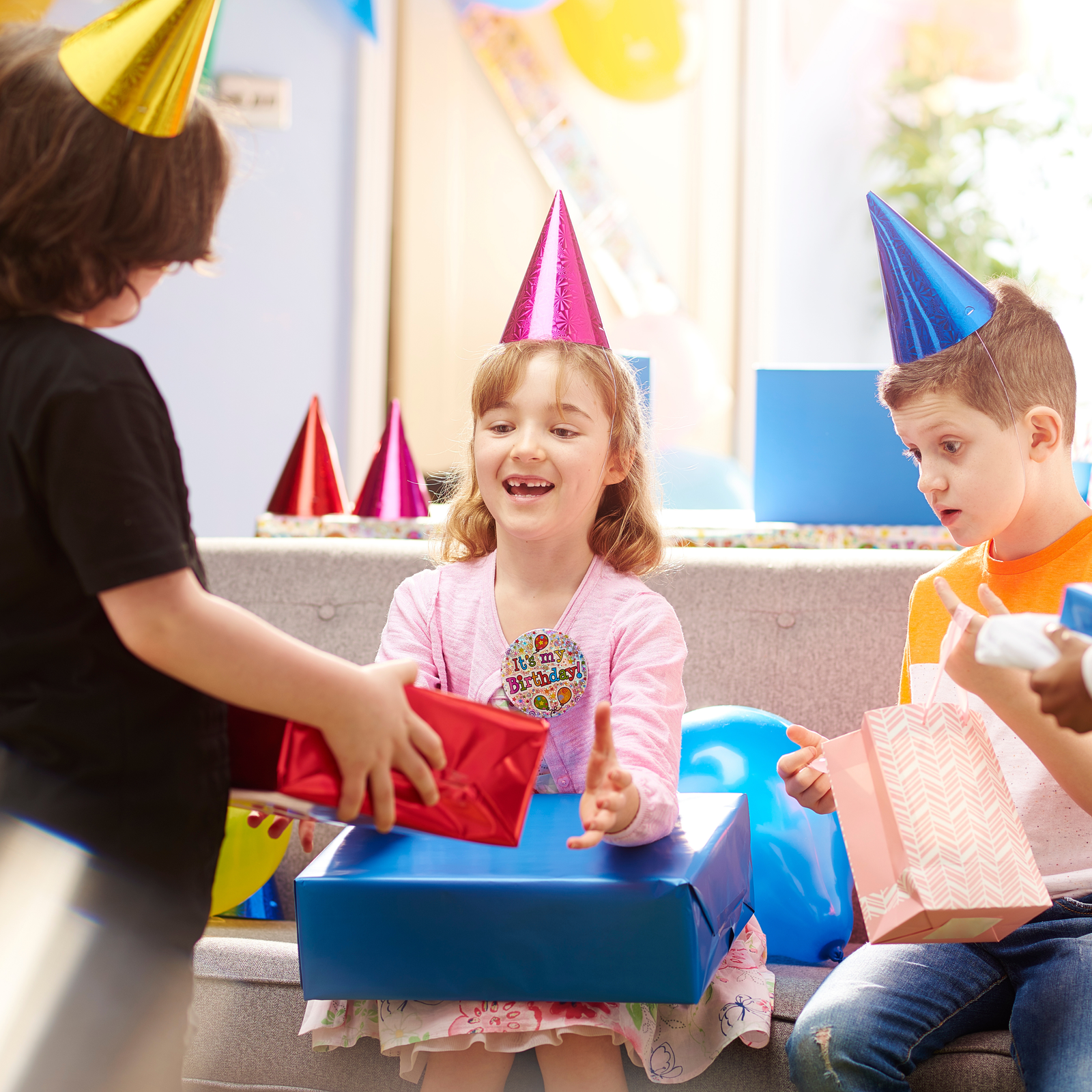 A couple celebrating a birthday with a cake